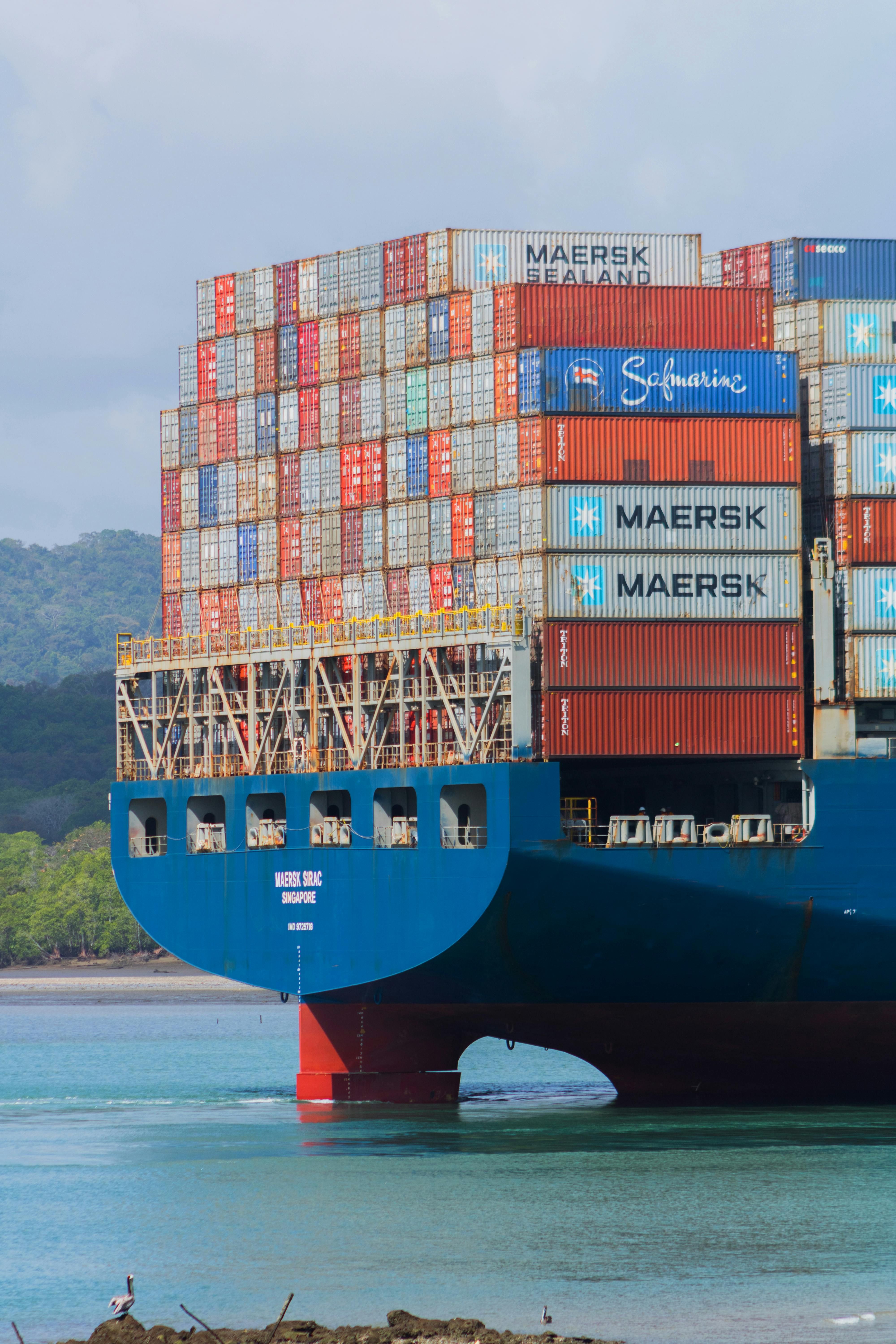 Photo by JESH.: https://www.pexels.com/photo/blue-ship-with-steel-cargo-containers-11299377/